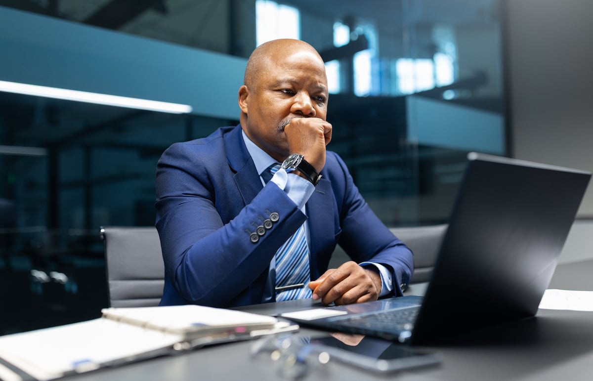 Experienced business professional at desk